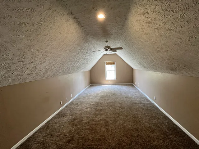 an empty room with a workbench