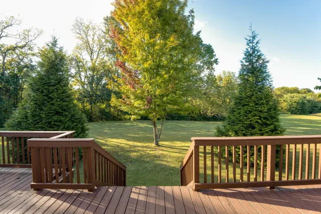 a view of deck with mountain view