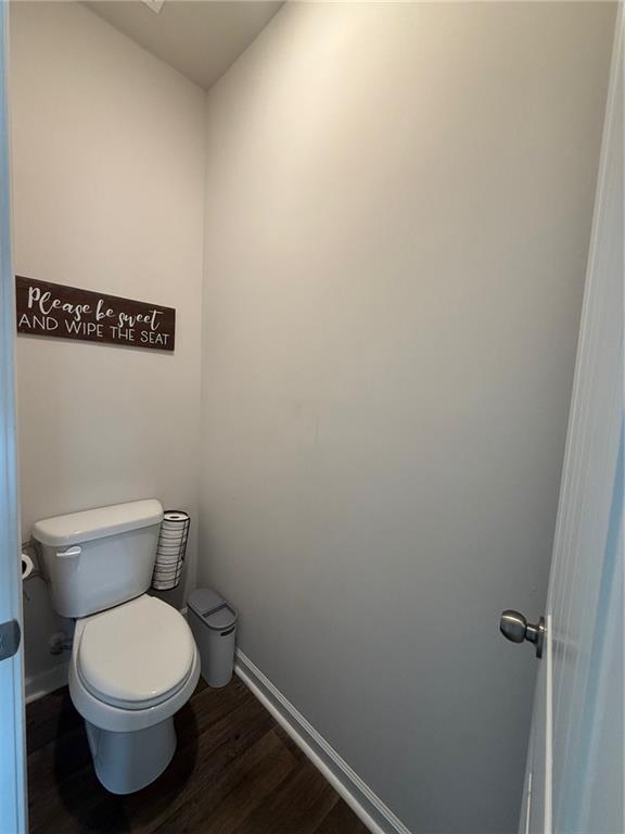 358 Mulberry Road Winder, GA 30680 - Photo 13 of 21 a white toilet sitting next to a shower