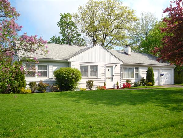 11 Spring Valley Road Natick, MA 01760 - Photo 1 of 1 a front view of a house with a yard porch and outdoor seating