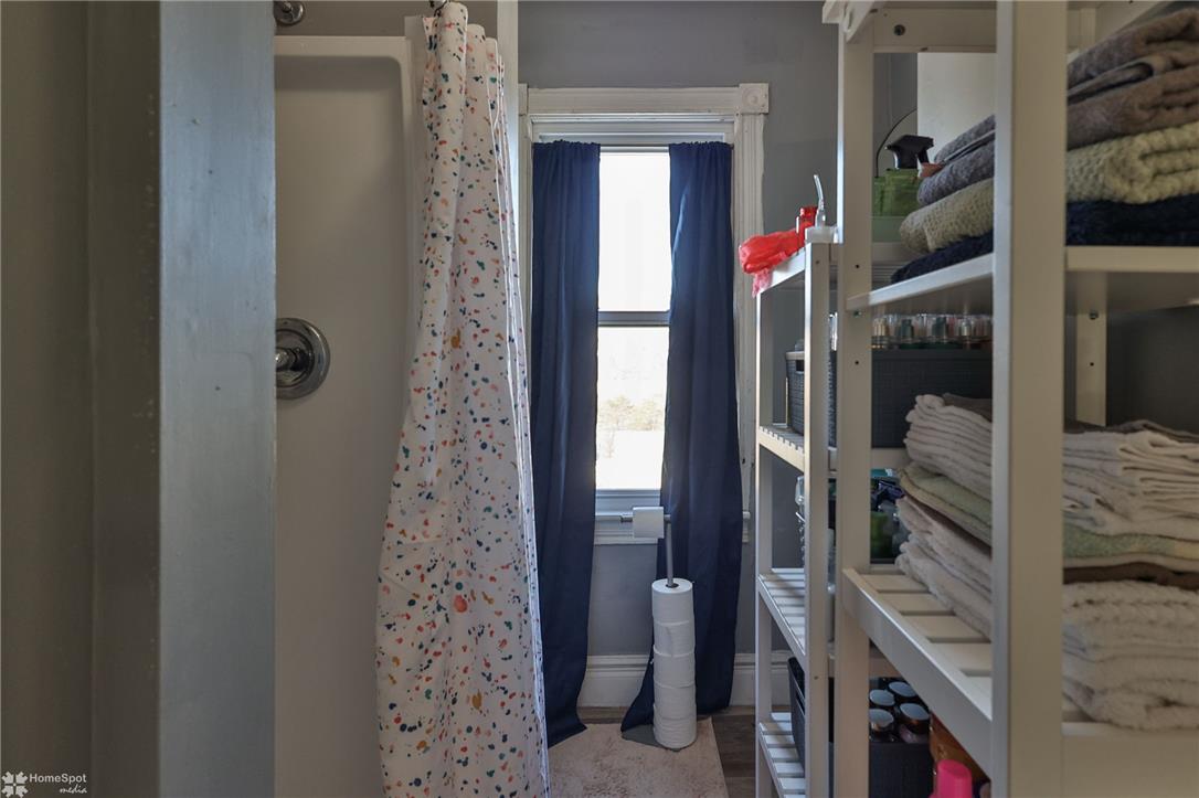 115 East Ruddle Street Coaldale, PA 18218 - Photo 46 of 57 Natural light streams through a window, illuminating this functional bathroom space.