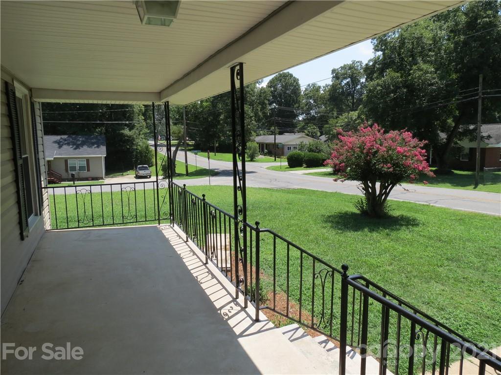 431 Union Cemetery Road Southwest Concord, NC 28027 - Photo 4 of 38 a view of a porch and garden
