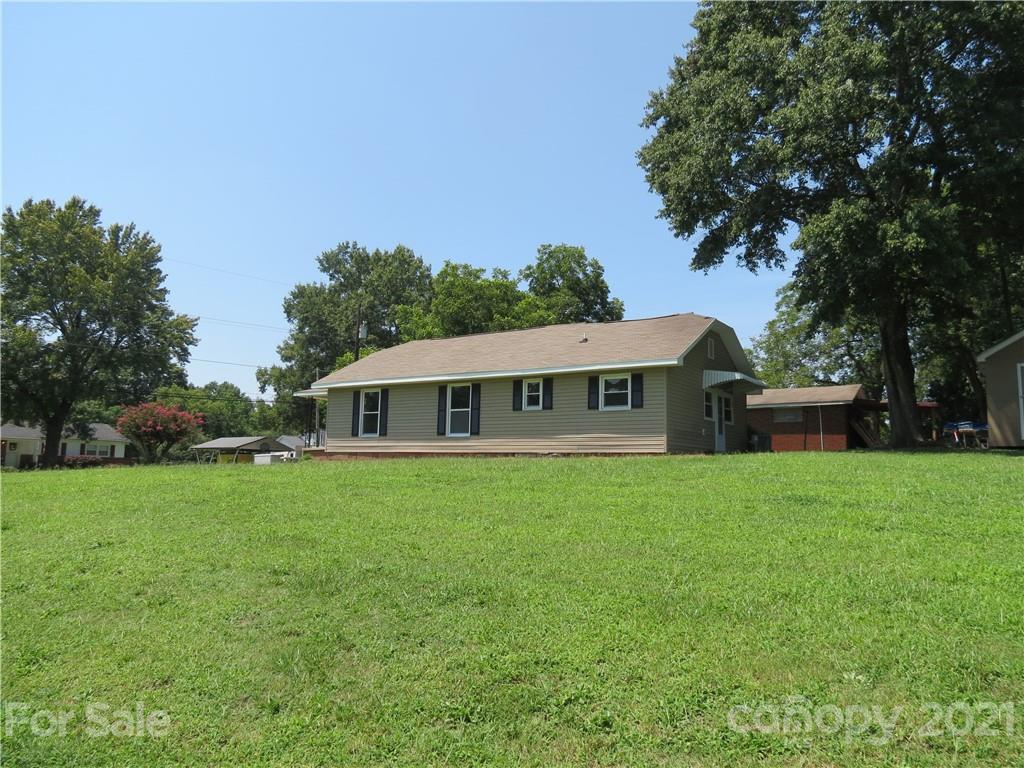 431 Union Cemetery Road Southwest Concord, NC 28027 - Photo 6 of 38 a view of a yard in front of the house