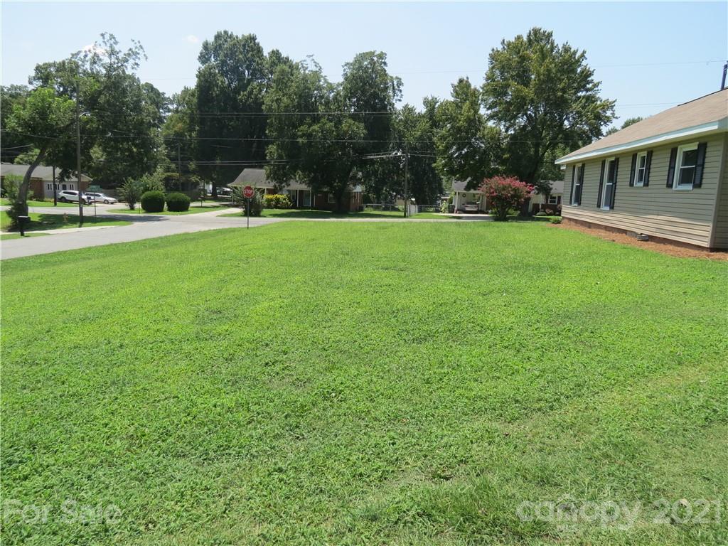 431 Union Cemetery Road Southwest Concord, NC 28027 - Photo 7 of 38 a view of a house with a big yard