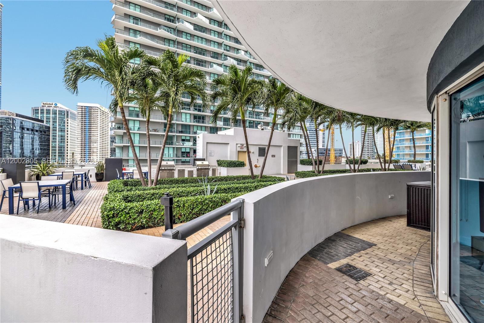 60 Southwest 13th Street, Unit 1124 Miami, FL 33130 - Photo 23 of 30 a view of a swimming pool and outdoor space