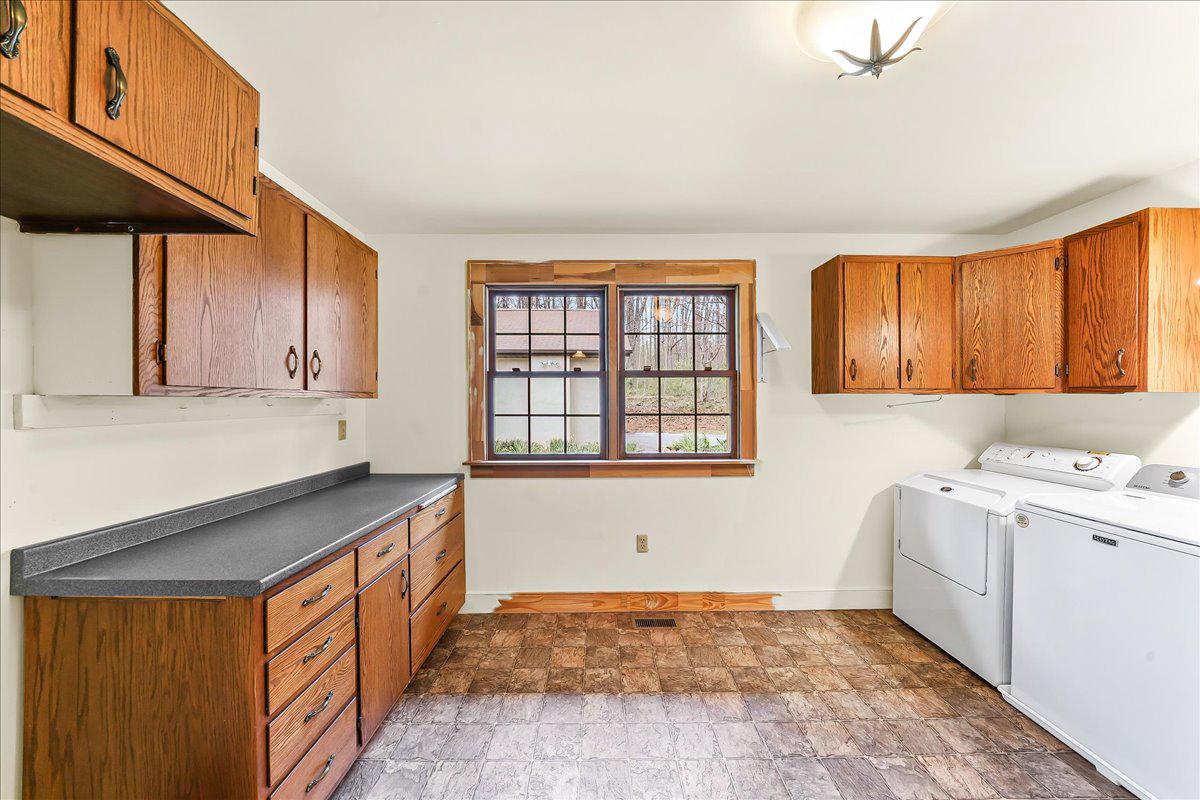 202 Creek Road Lincoln University, PA 19352 - Photo 14 of 36 a kitchen with stainless steel appliances granite countertop a sink stove and cabinets
