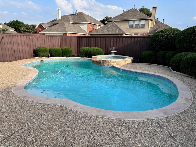 a view of a backyard with a garden