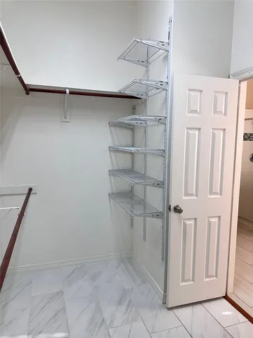 a bathroom with a sink and a shower