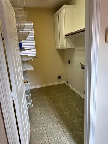 a view of storage and utility room