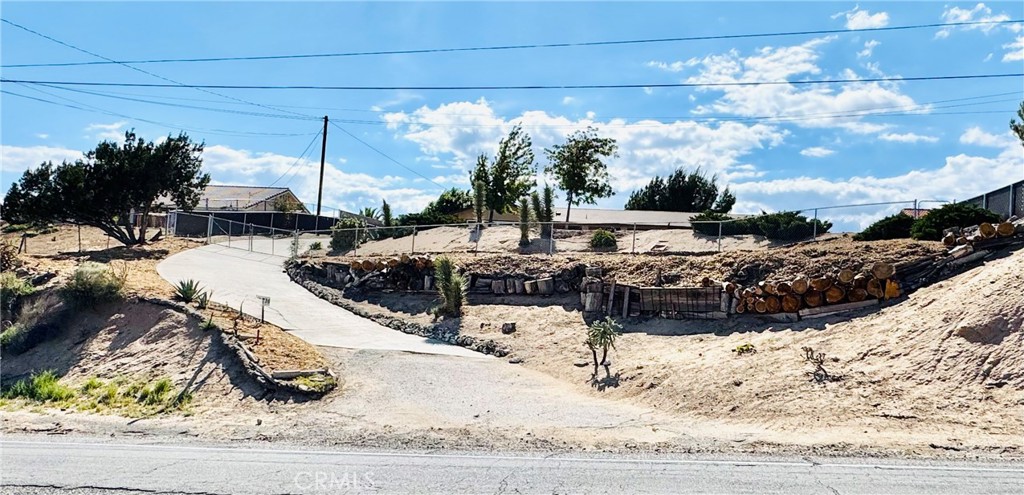6736 Summit Valley Road Hesperia, CA 92345 - Photo 24 of 24 a view of a backyard of the house