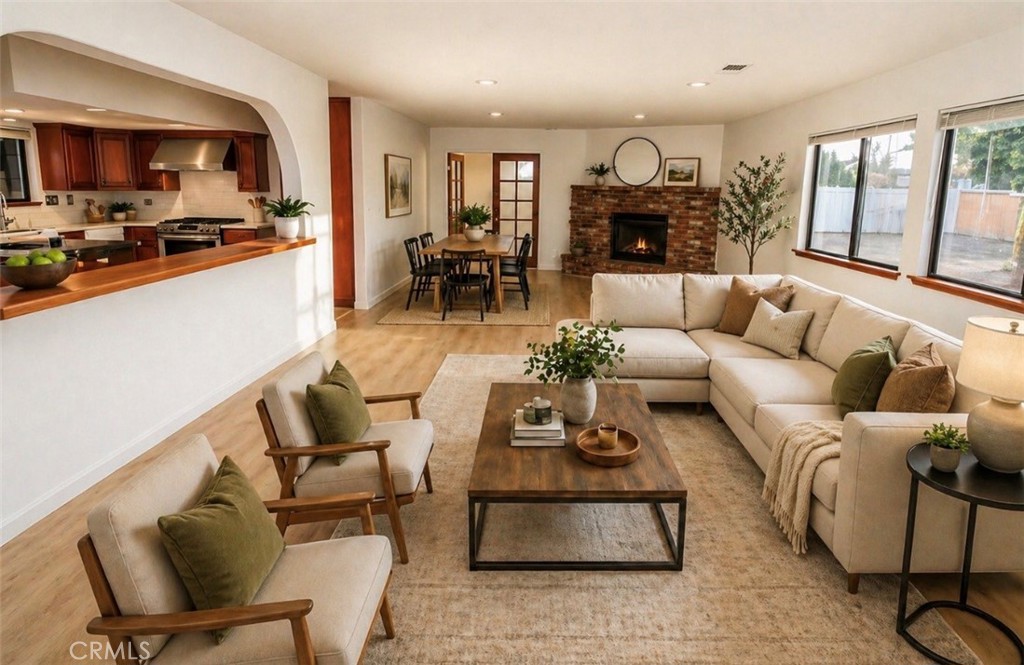 6736 Summit Valley Road Hesperia, CA 92345 - Photo 10 of 24 a living room with furniture fireplace and flat screen tv