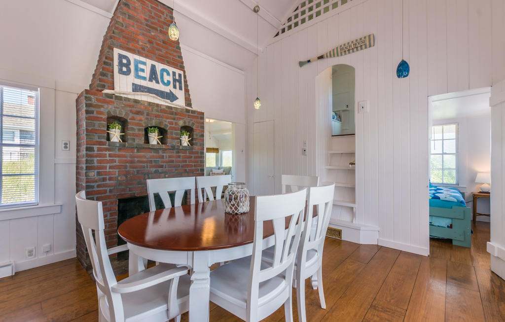 217 Phillips Road Sandwich, MA 02562 - Photo 13 of 37 a view of a dining room with furniture and wooden floor