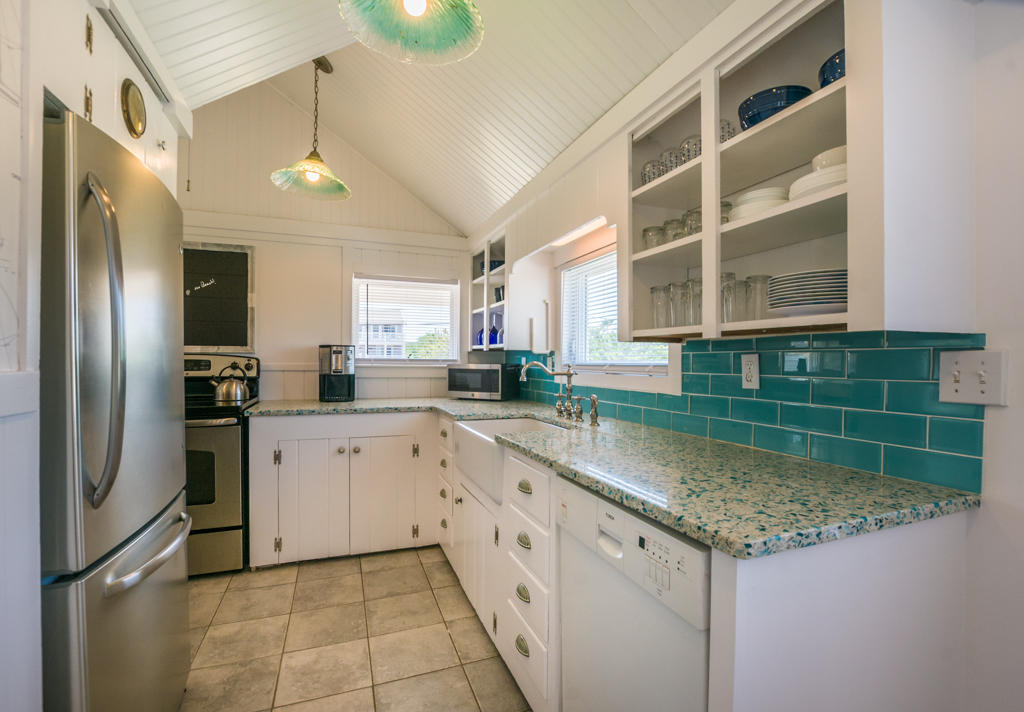 217 Phillips Road Sandwich, MA 02562 - Photo 23 of 37 a kitchen with stainless steel appliances granite countertop a sink and a refrigerator