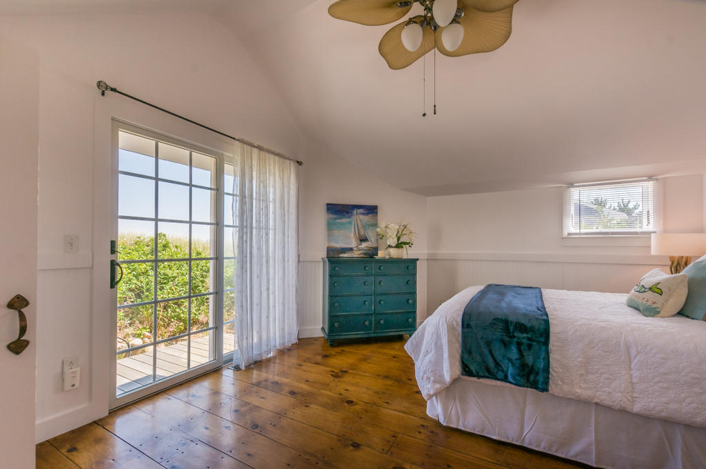 217 Phillips Road Sandwich, MA 02562 - Photo 25 of 37 a bedroom with a bed and window