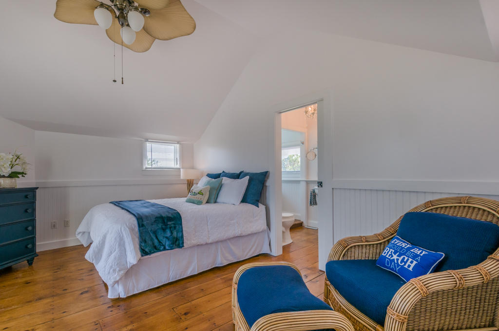 217 Phillips Road Sandwich, MA 02562 - Photo 26 of 37 a bedroom with furniture and a window