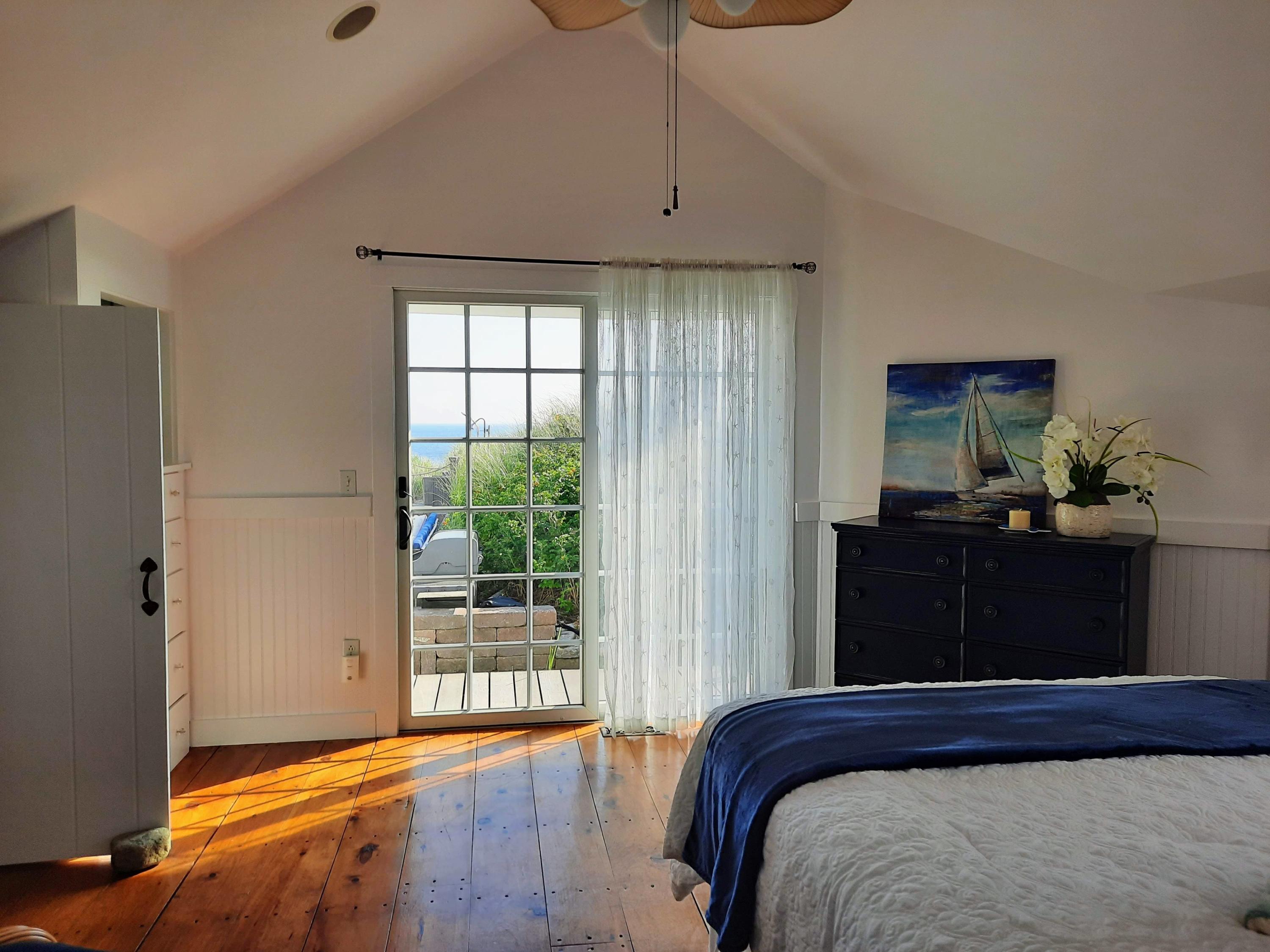 217 Phillips Road Sandwich, MA 02562 - Photo 27 of 37 a bedroom with a bed and a window