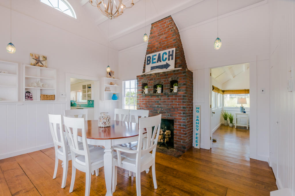 217 Phillips Road Sandwich, MA 02562 - Photo 10 of 37 a view of a dining room with furniture and wooden floor