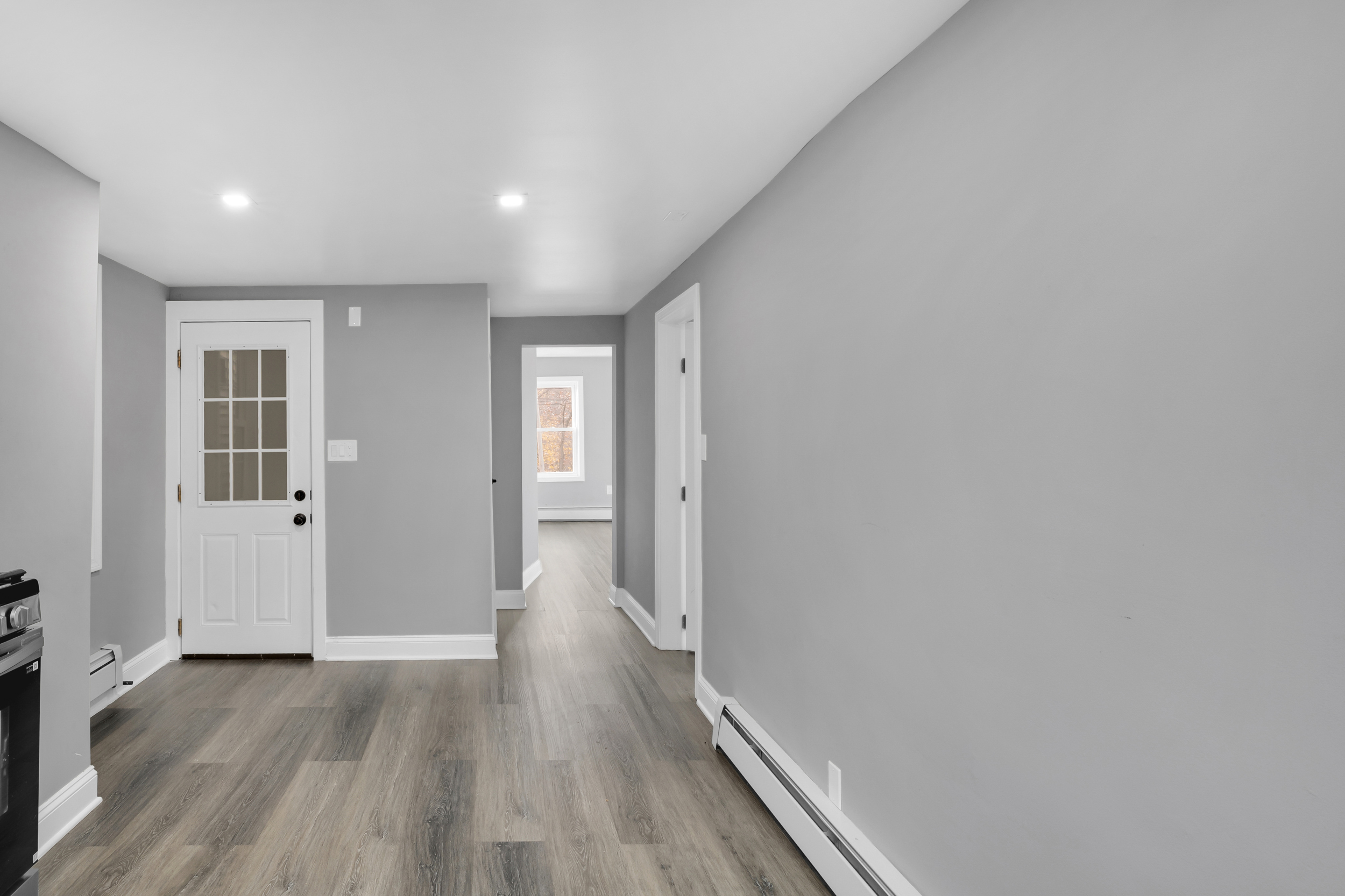 720 Main Street Winchester, CT 06098 - Photo 27 of 38 a view of hallway with wooden floor
