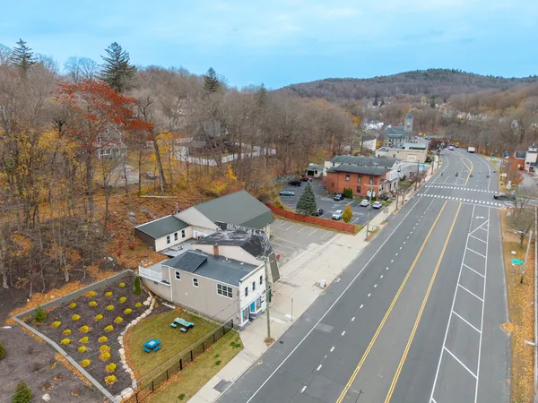 a view of a balcony with two chairs