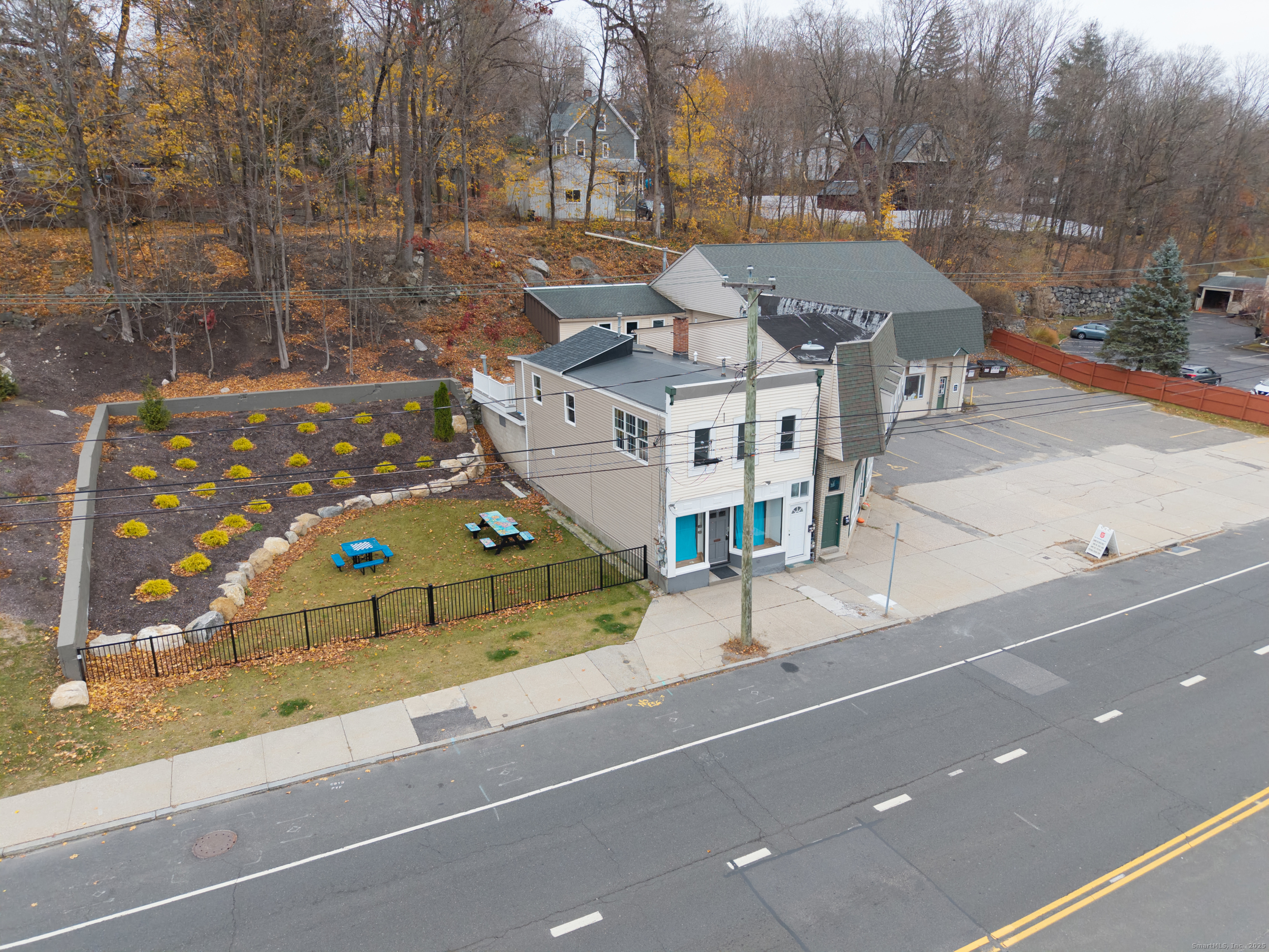 720 Main Street Winchester, CT 06098 - Photo 36 of 38 a view of a tennis ground with large trees