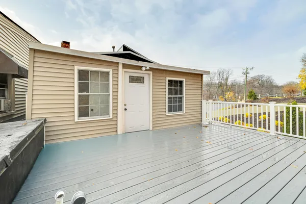 a view of a house with deck