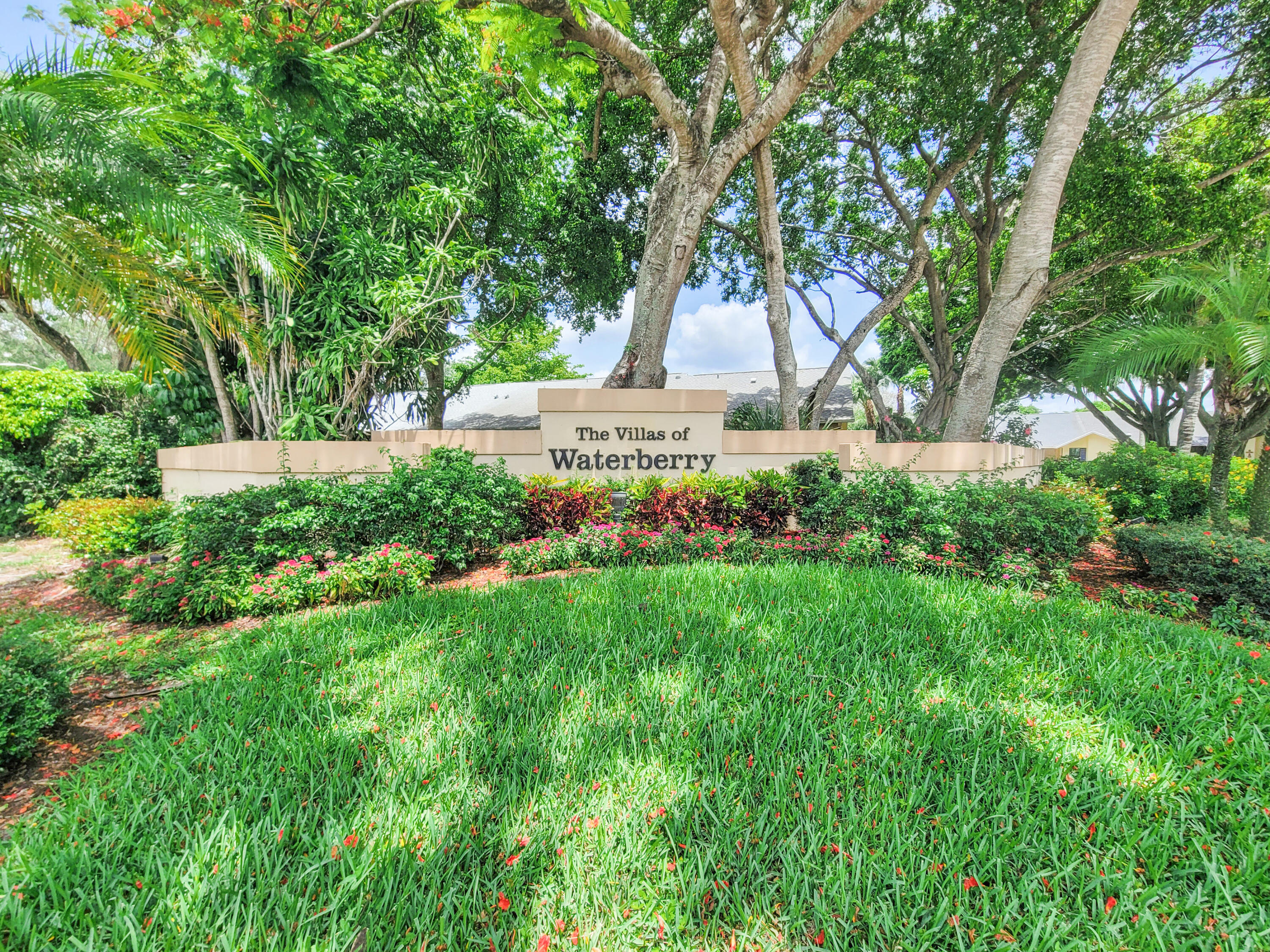 10900 Waterberry Court Boca Raton, FL 33498 - Photo 1 of 28 a view of front of a house with a yard