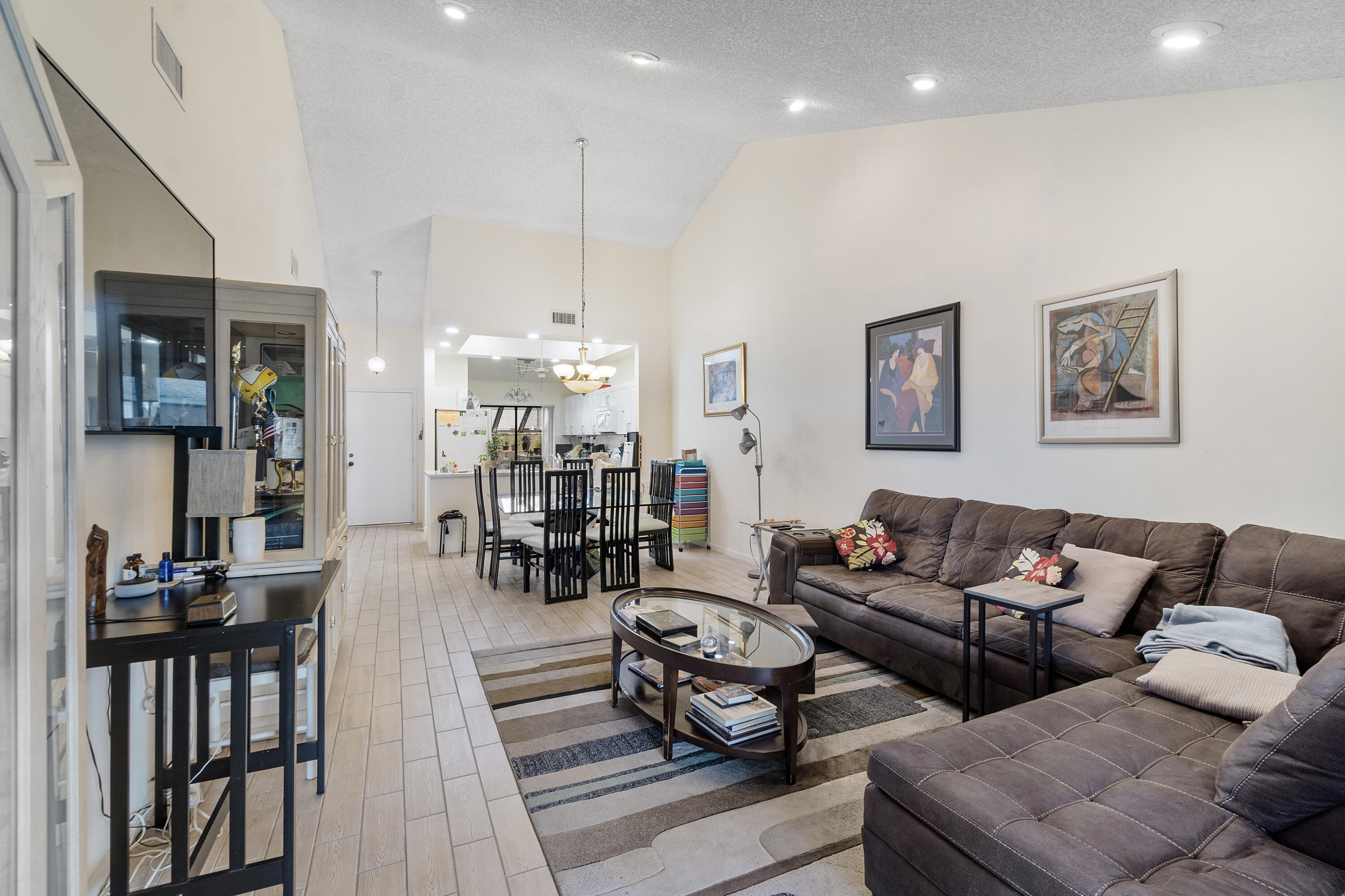 10900 Waterberry Court Boca Raton, FL 33498 - Photo 5 of 28 a living room with furniture and wooden floor