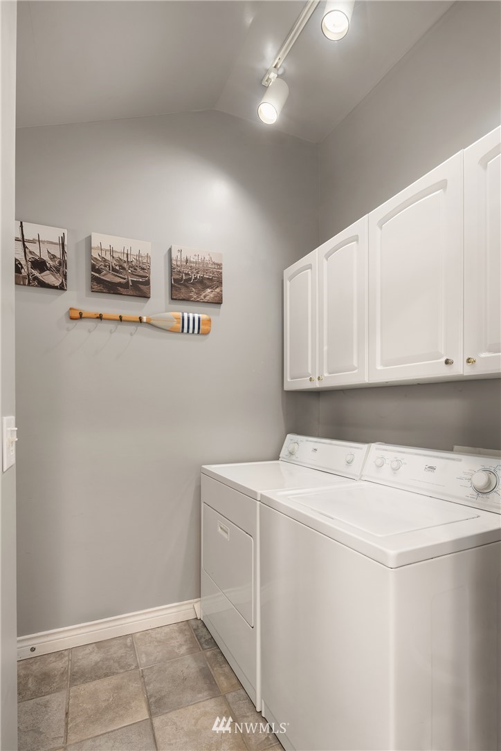 458 Grandey Way Northeast Renton, WA 98056 - Photo 14 of 18 a utility room with dryer and washer