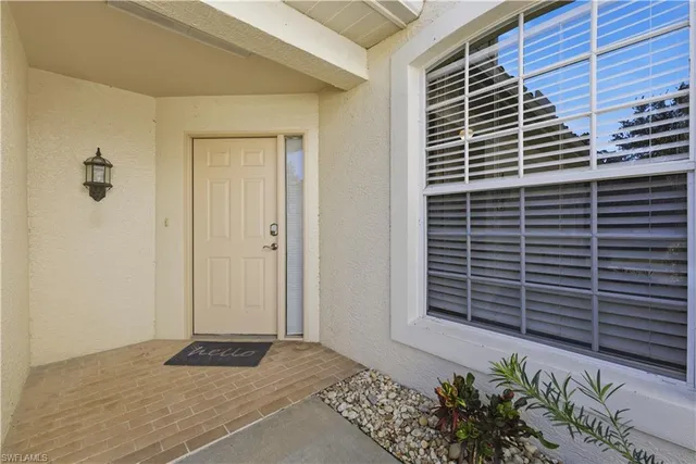a view of front door and wooden door