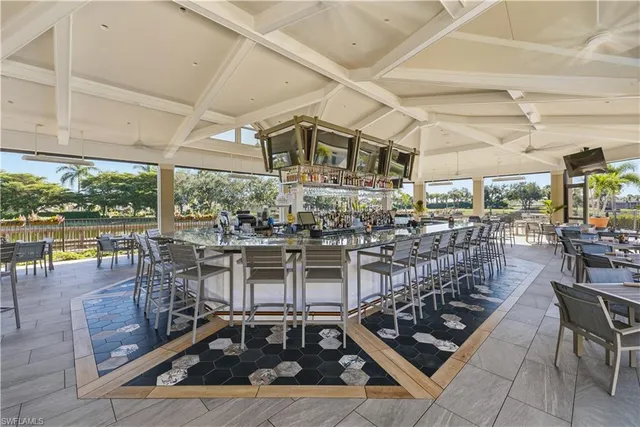 a outdoor space with lots of tables and chairs