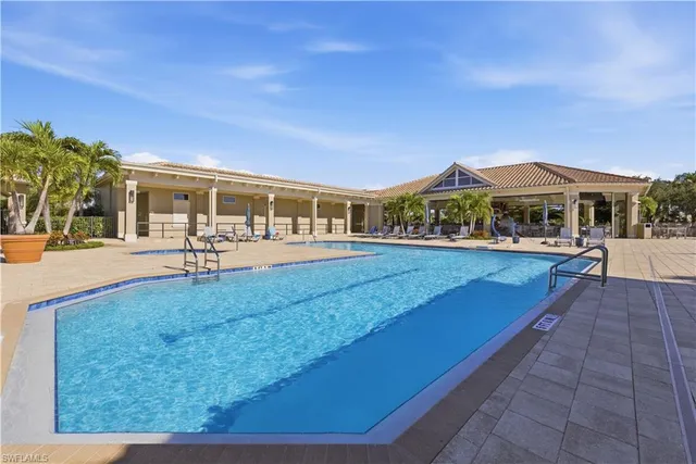 a view of a yard and front view of a house