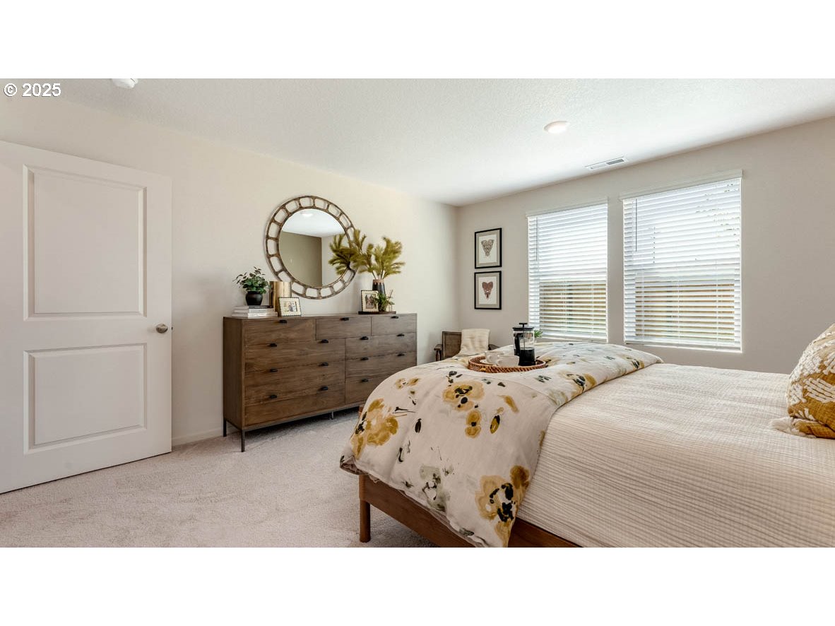 348 Greencrest Street Northeast Salem, OR 97301 - Photo 21 of 26 a bedroom with a bed and a window