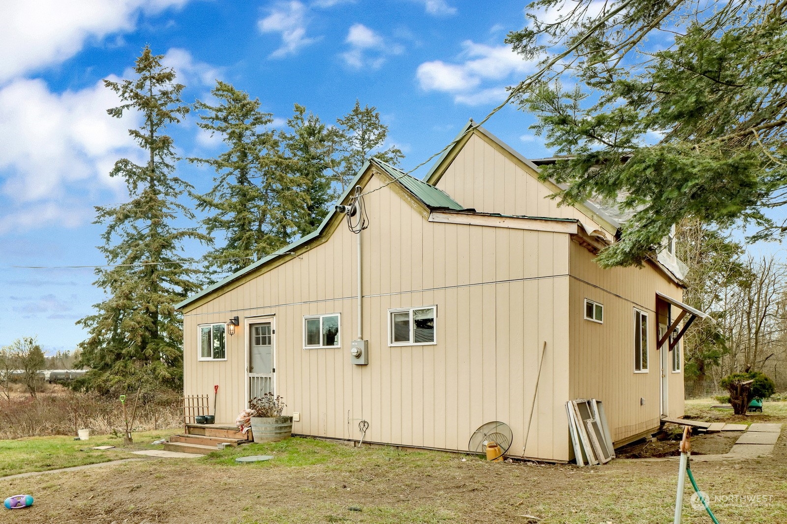 3534 Arnie Road Custer, WA 98240 - Photo 18 of 34 a view of a white house with a yard