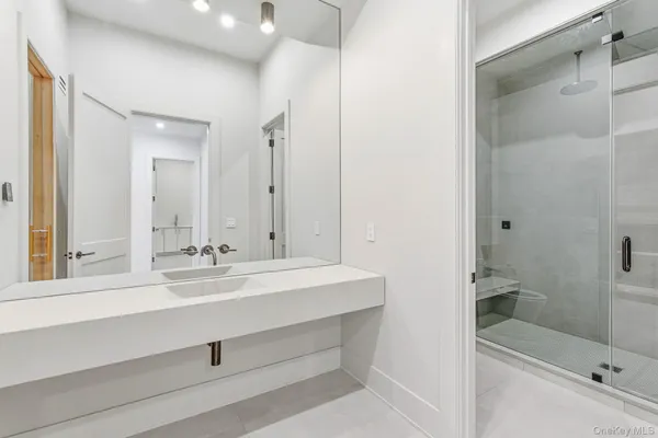 a bathroom with a sink and a mirror