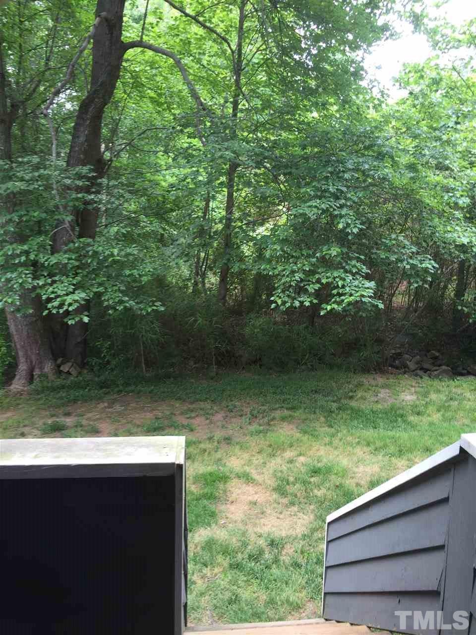 1439 Quarter Point Raleigh, NC 27615 - Photo 4 of 14 a view of a yard from a balcony