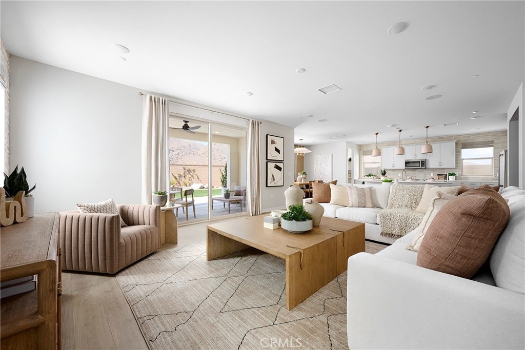 26117 Pepper Tree Ridge Road Corona, CA 92883 - Photo 6 of 15 Model Photos: Photos shown are of the model home for this floor plan. Actual finishes, features, and landscaping may vary.