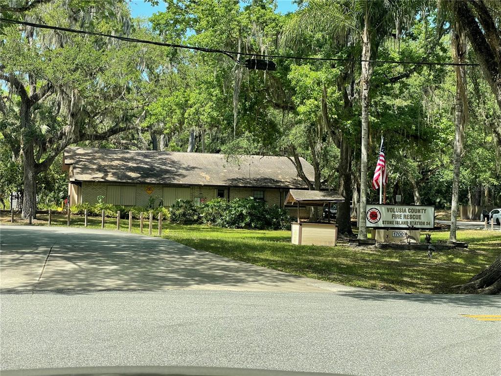 1496 Kettledrum Trail Deltona, FL 32725 - Photo 11 of 11 a view of a house with a yard and sitting area