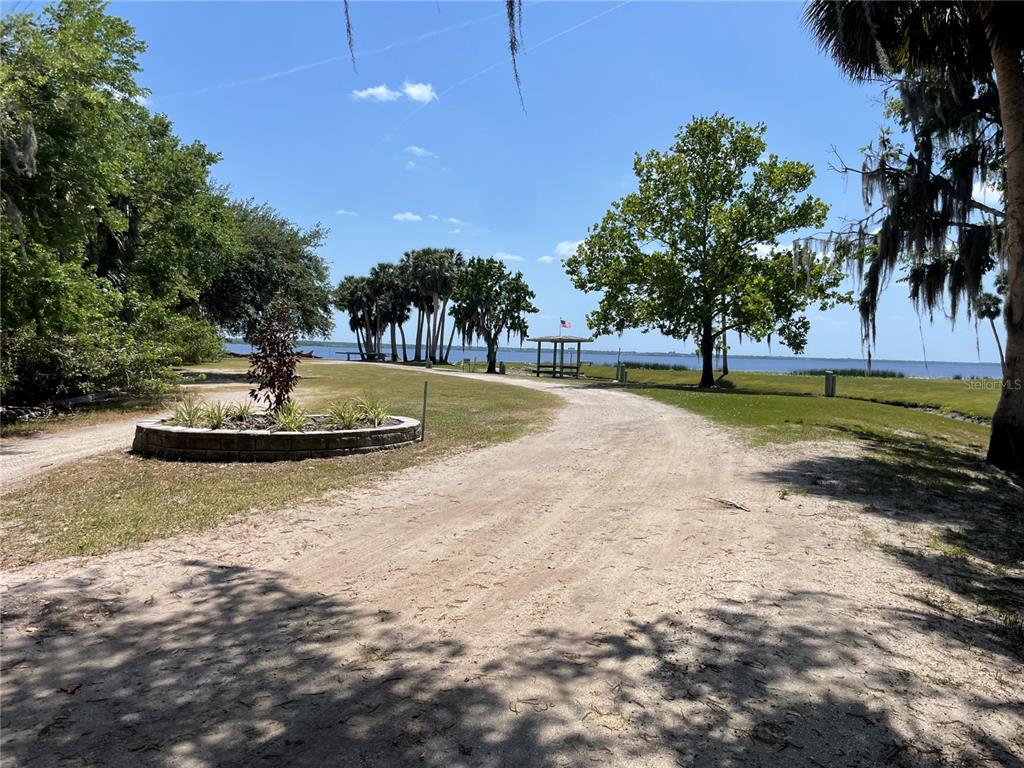 1496 Kettledrum Trail Deltona, FL 32725 - Photo 7 of 11 a view of a swimming pool with a yard
