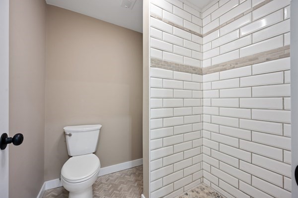 5 Monmouth Street Boston, MA 02128 - Photo 17 of 40 a bathroom with a toilet and a shower