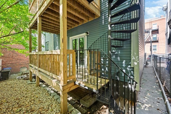 5 Monmouth Street Boston, MA 02128 - Photo 3 of 40 a view of a balcony with door