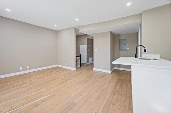 5 Monmouth Street Boston, MA 02128 - Photo 33 of 40 a room with a sink and a mirror