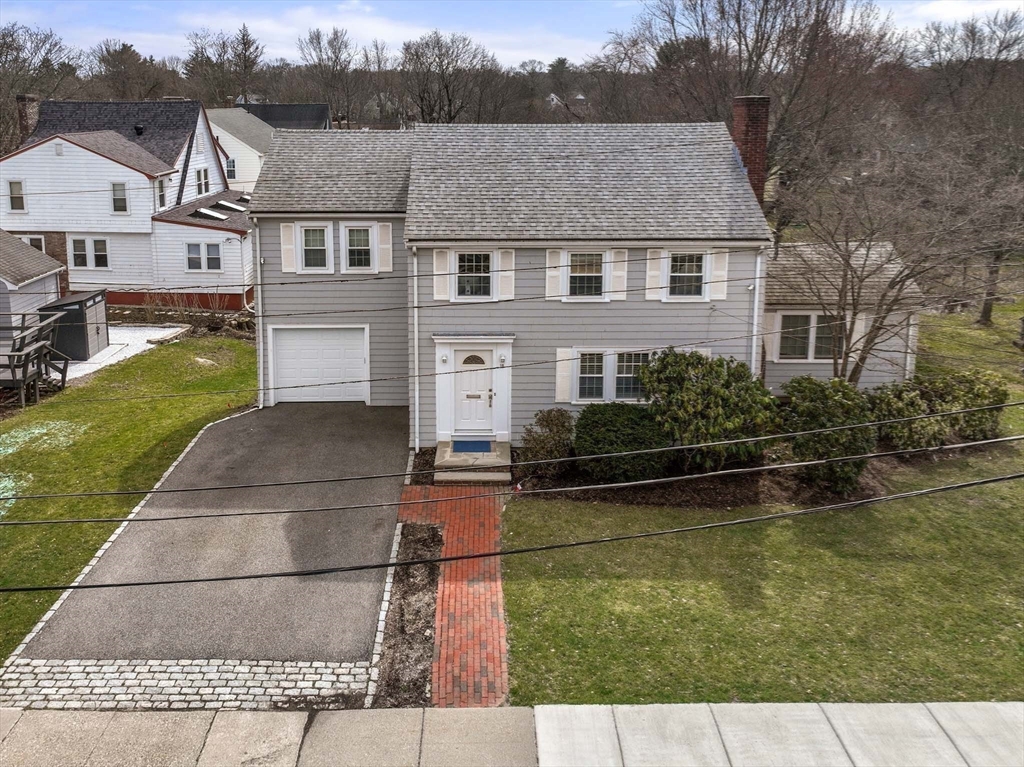 10 Kendall Road Newton, MA 02459 - Photo 16 of 21 a aerial view of a house with swimming pool and a yard