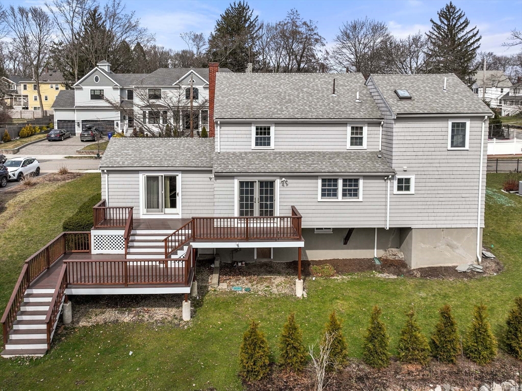 10 Kendall Road Newton, MA 02459 - Photo 20 of 21 a front view of a house with garden