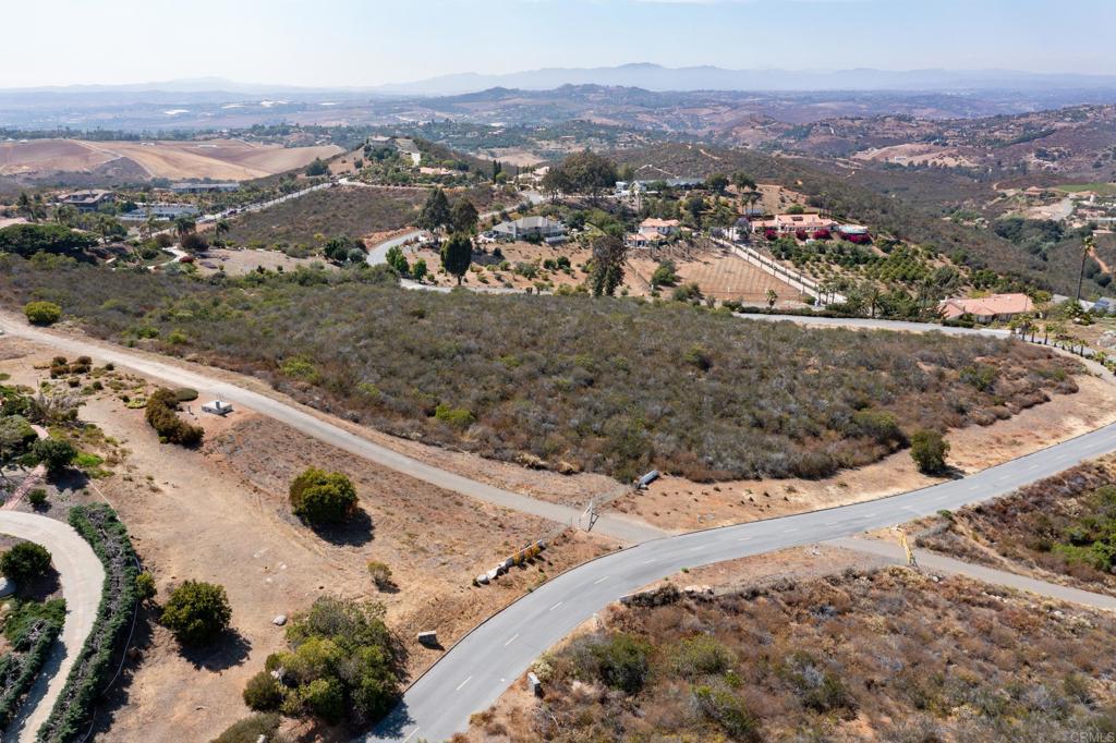 Elevado Rd Vista Vista, CA 92084 - Photo 8 of 11 an aerial view of residential houses with outdoor space