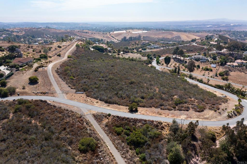 Elevado Rd Vista Vista, CA 92084 - Photo 9 of 11 an aerial view of residential houses with outdoor space