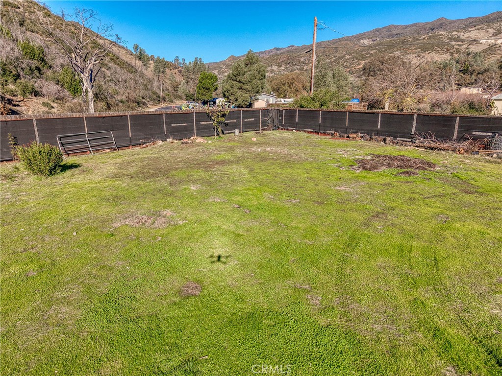 3865 Spring Valley Road Clearlake Oaks, CA 95423 - Photo 13 of 20 a view of a backyard