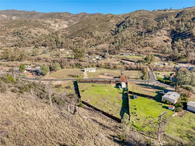a view of a pool with a mountain in the background