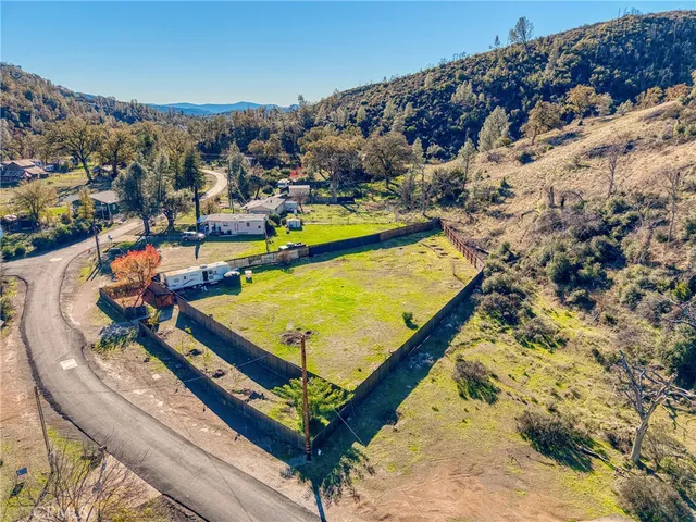 a view of a pool with chairs