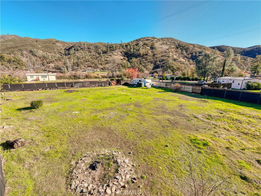 3865 Spring Valley Road Clearlake Oaks, CA 95423 - Photo 8 of 20 a view of lake with mountain