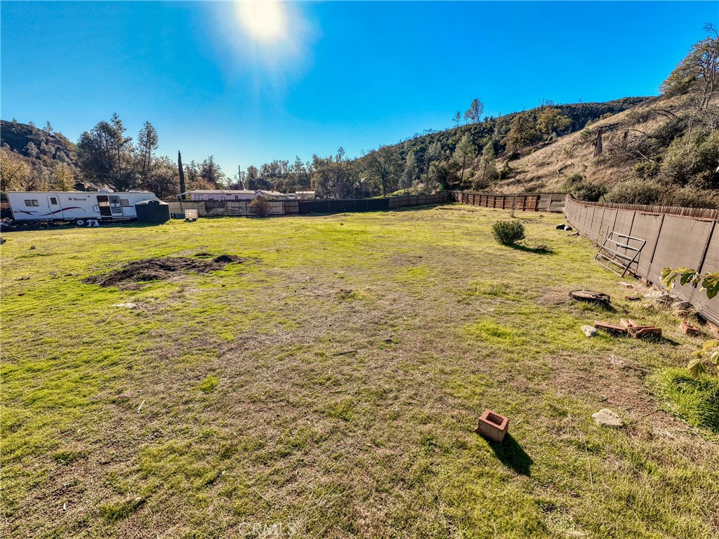 3865 Spring Valley Road Clearlake Oaks, CA 95423 - Photo 9 of 20 a view of a swimming pool with an ocean view
